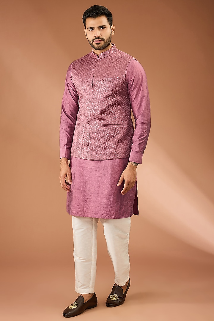 Mauve Pink Raw Silk Thread & Sequins Embroidered Bundi Jacket Set by RNG Safawala Men