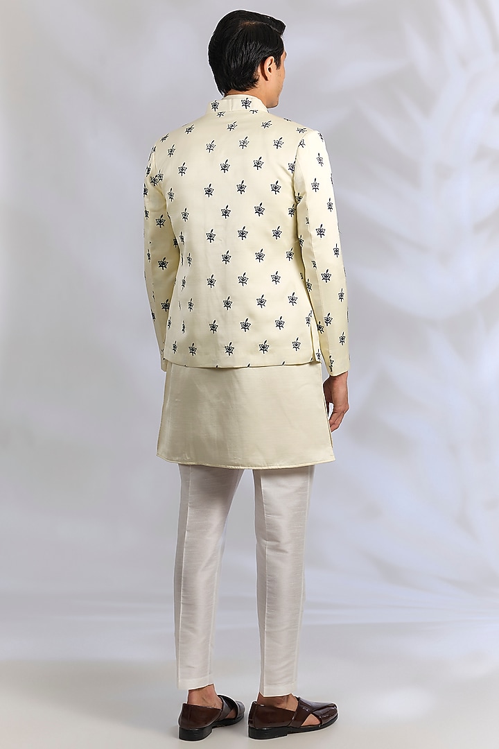 Cream Raw Silk Thread Embroidered Wedding Indowestern Set by RNG Safawala Men at Pernia's Pop Up Shop