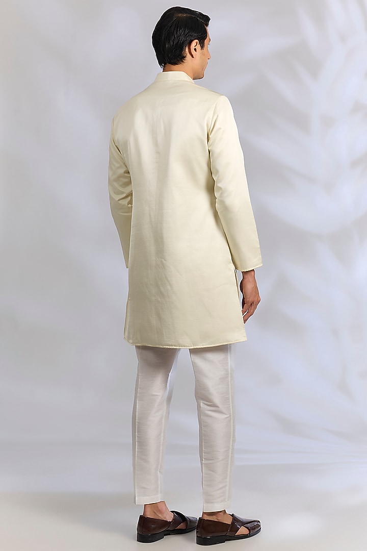 Cream Raw Silk Thread Embroidered Wedding Indowestern Set by RNG Safawala Men at Pernia's Pop Up Shop