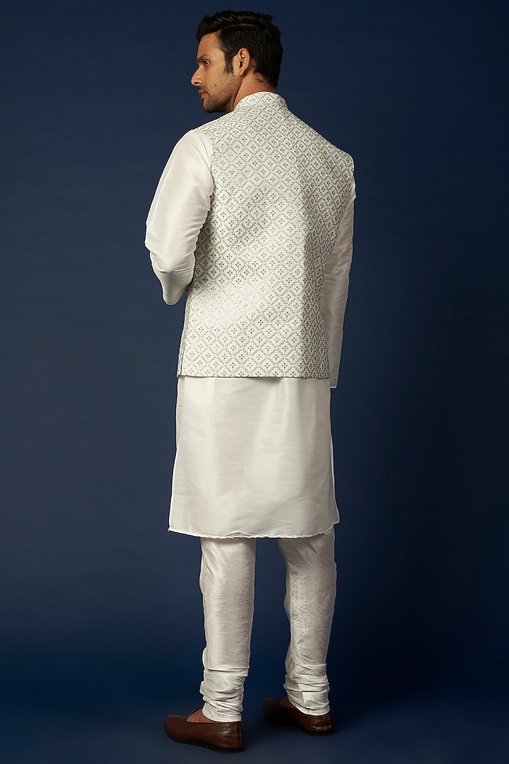 Ivory Linen Silk Thread & Sequins Embroidered Bundi Jacket Set by RNG Safawala Men at Pernia's Pop Up Shop