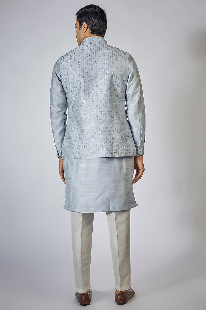 Powder Blue Raw Silk Sequin Embroidered Bundi Jacket Set by RNG Safawala Men at Pernia's Pop Up Shop