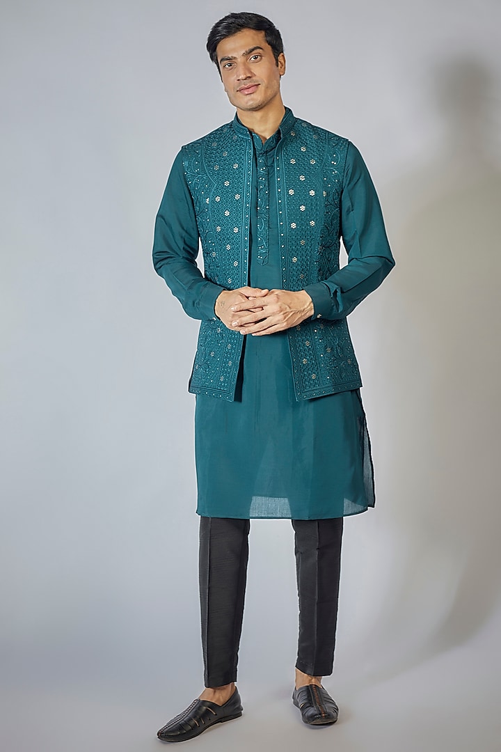 Blue Raw Silk Embroidered Bundi Jacket Set by RNG Safawala Men