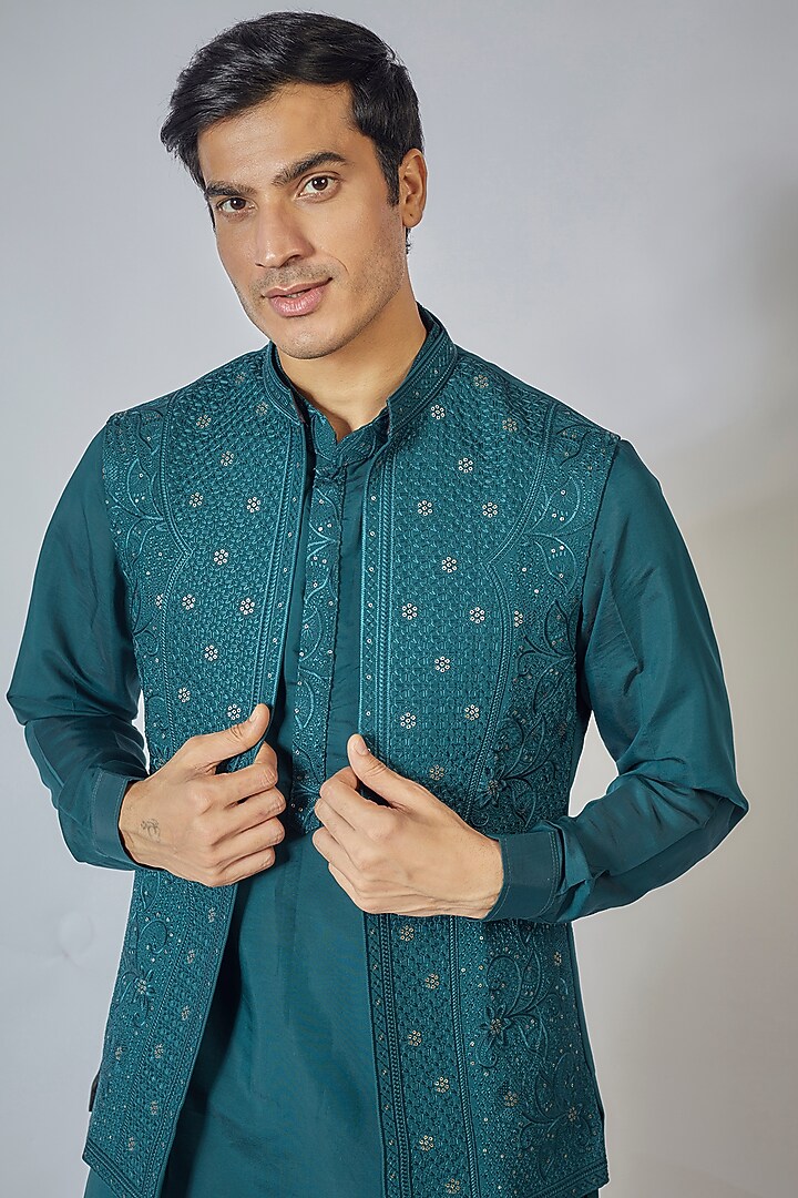 Blue Raw Silk Embroidered Bundi Jacket Set by RNG Safawala Men at Pernia's Pop Up Shop