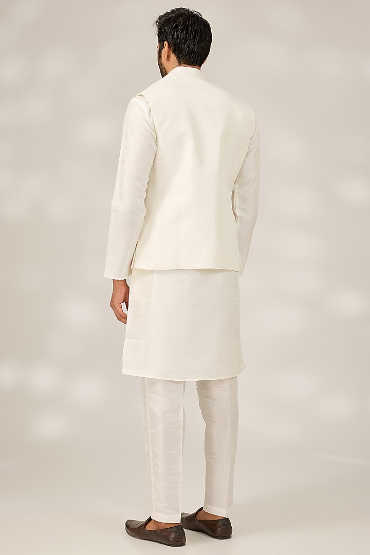 Off-White Raw Silk Embroidered Nehru Jacket Set by RNG Safawala Men at Pernia's Pop Up Shop