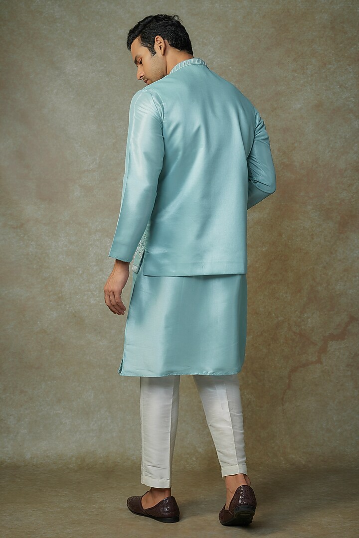 Powder Blue Muslin Silk Cutdana Embroidered Bundi Jacket Set by RNG Safawala Men at Pernia's Pop Up Shop