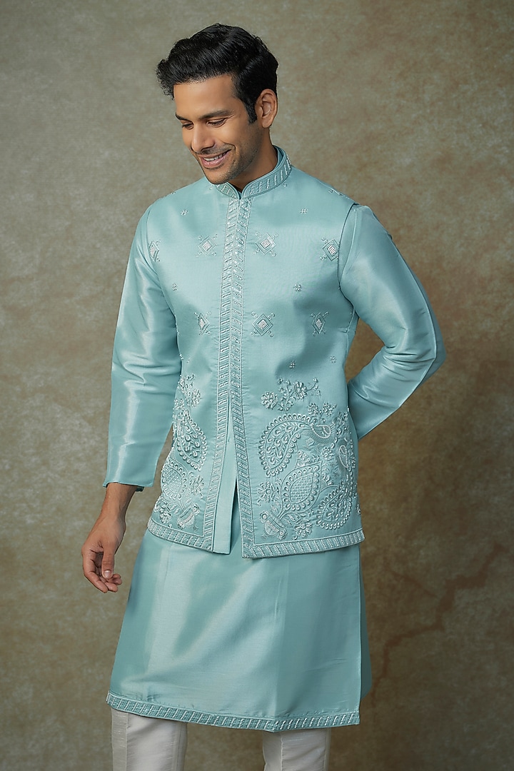 Powder Blue Muslin Silk Cutdana Embroidered Bundi Jacket Set by RNG Safawala Men at Pernia's Pop Up Shop