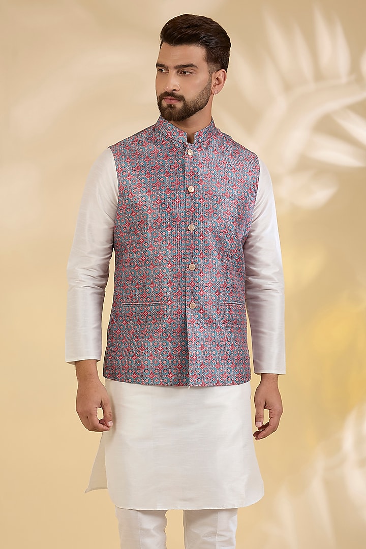 Blue Raw Silk Floral Printed Bundi Jacket by RNG Safawala Men at Pernia's Pop Up Shop