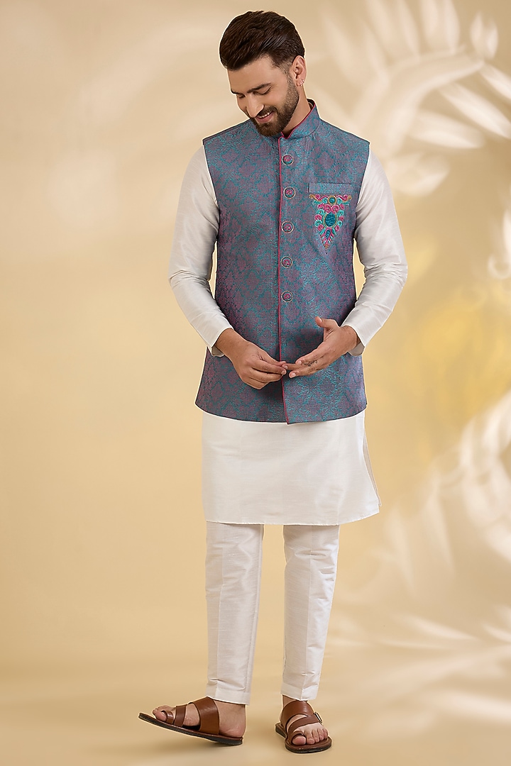 Blue Cotton Linen Floral Embroidered Bundi Jacket by RNG Safawala Men at Pernia's Pop Up Shop