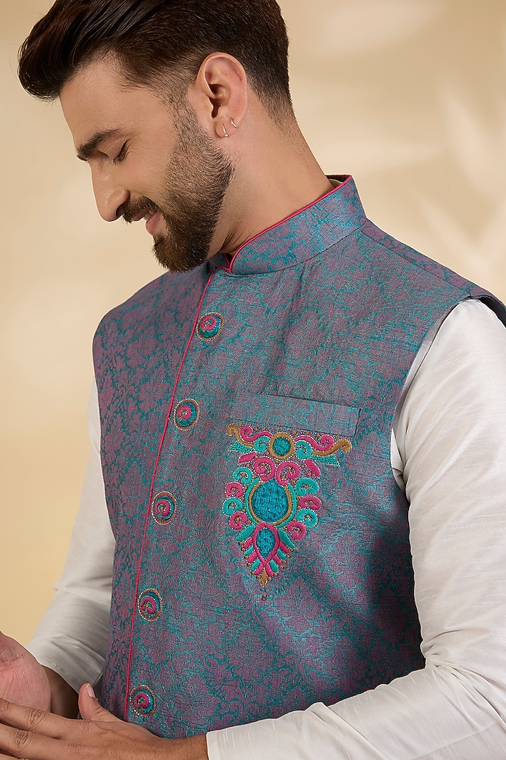 Blue Cotton Linen Floral Embroidered Bundi Jacket by RNG Safawala Men at Pernia's Pop Up Shop