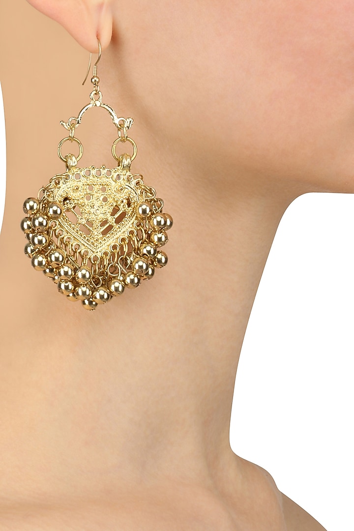 Ritika Sachdeva presents Gold finish embossed paan motif earrings available only at Pernia's Pop Up Shop.