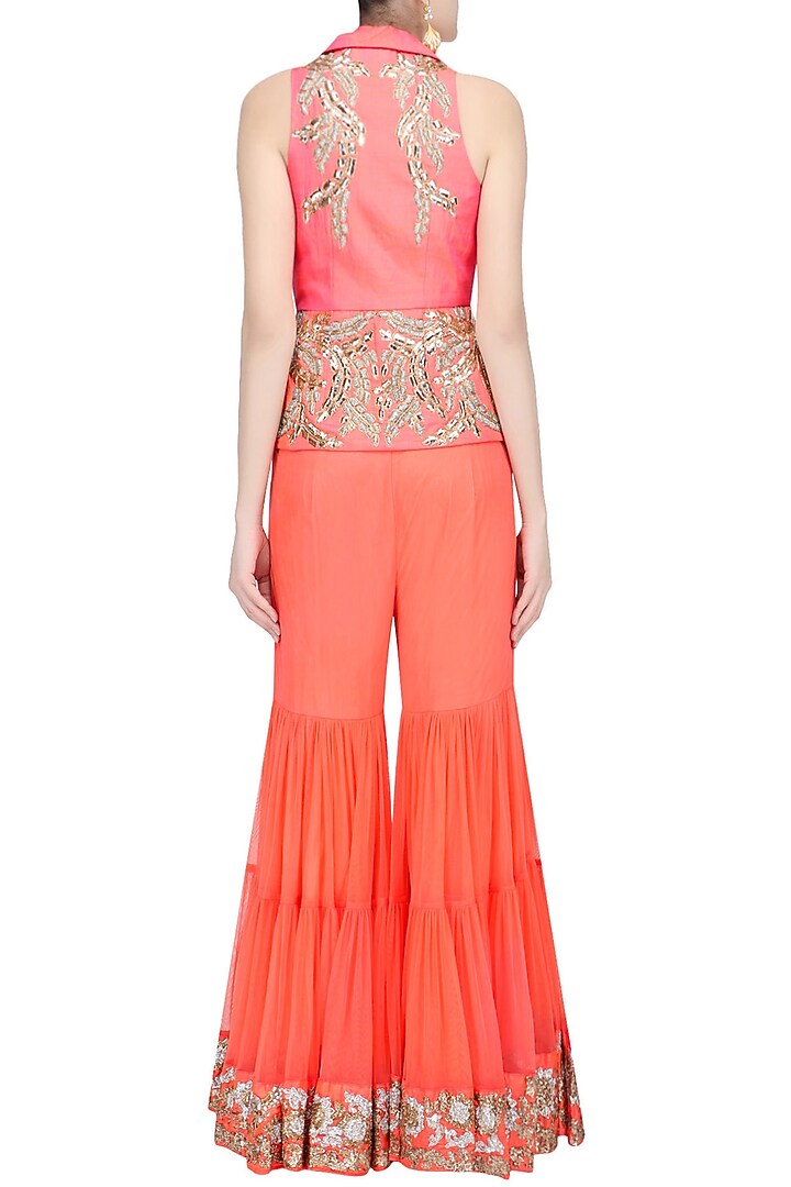 Coral and gold pita embroidered jacket and sharara pants set available only at Pernia's Pop Up Shop.