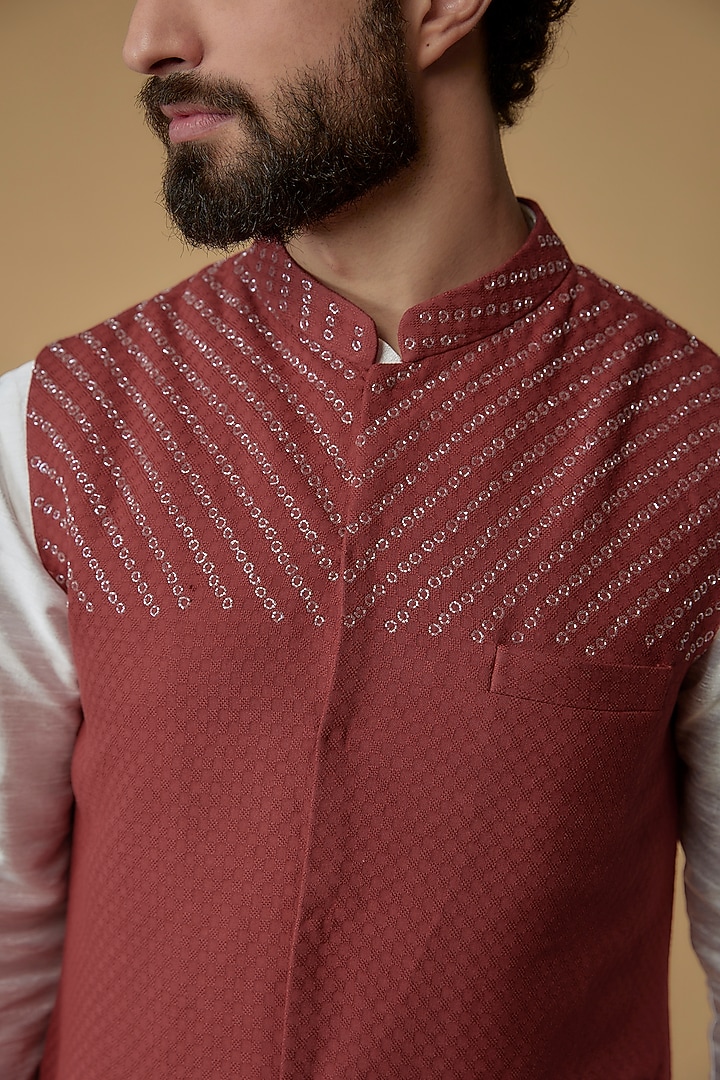 Brick Red Self Textured Cotton Hand Embroidered Nehru Jacket by Ritambh at Pernia's Pop Up Shop