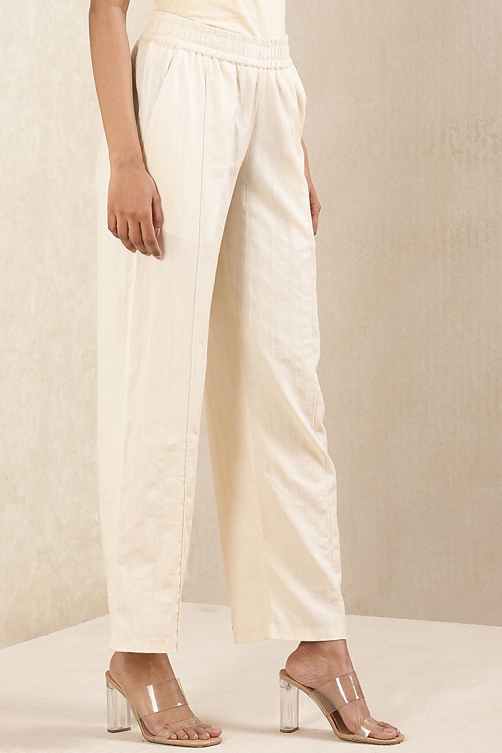 Beige Cotton Dobby Palazzo Pants by Ritu Kumar at Pernia's Pop Up Shop