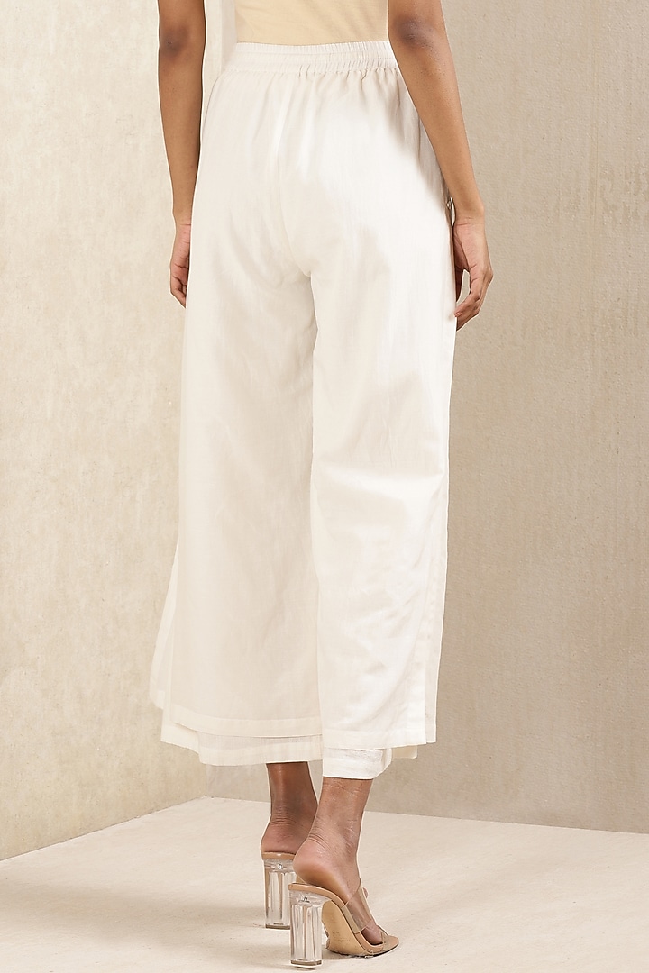 White Cotton Dobby Palazzo Pants by Ritu Kumar at Pernia's Pop Up Shop