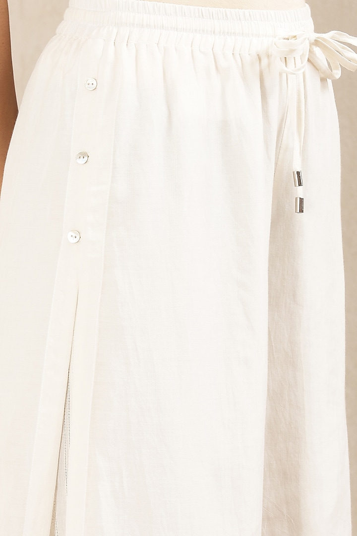 White Cotton Dobby Palazzo Pants by Ritu Kumar at Pernia's Pop Up Shop