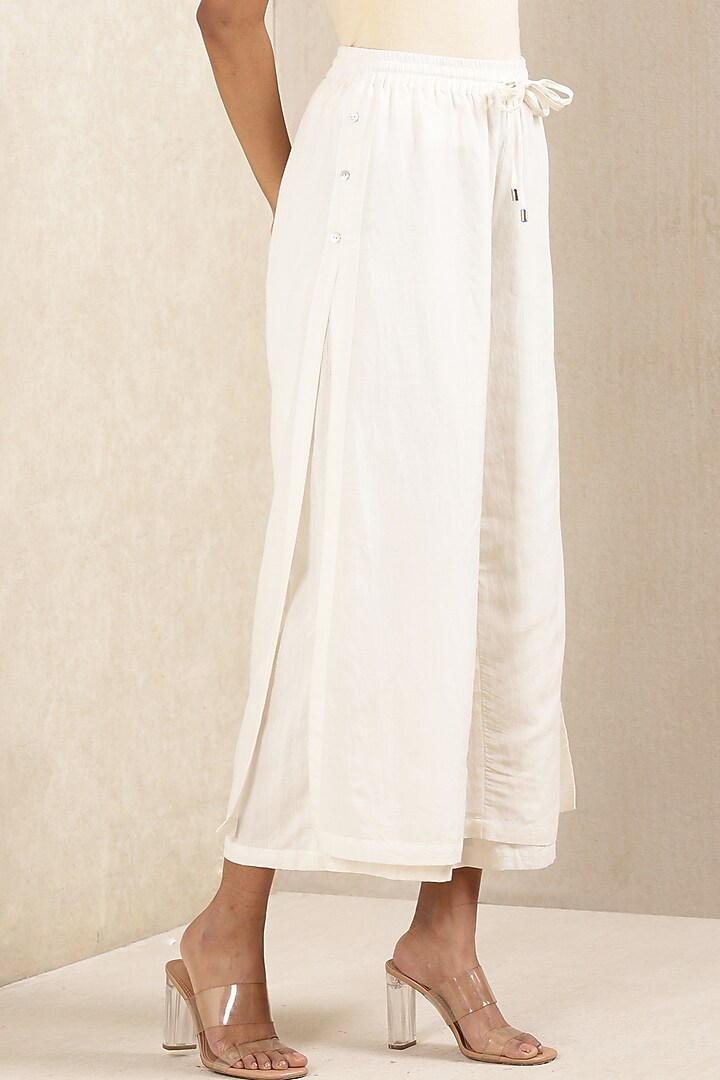 White Cotton Dobby Palazzo Pants by Ritu Kumar at Pernia's Pop Up Shop