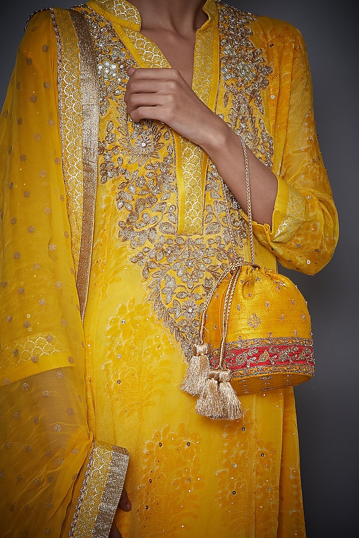 Yellow Raw Silk Printed Potli by Ri Ritu Kumar at Pernia's Pop Up Shop