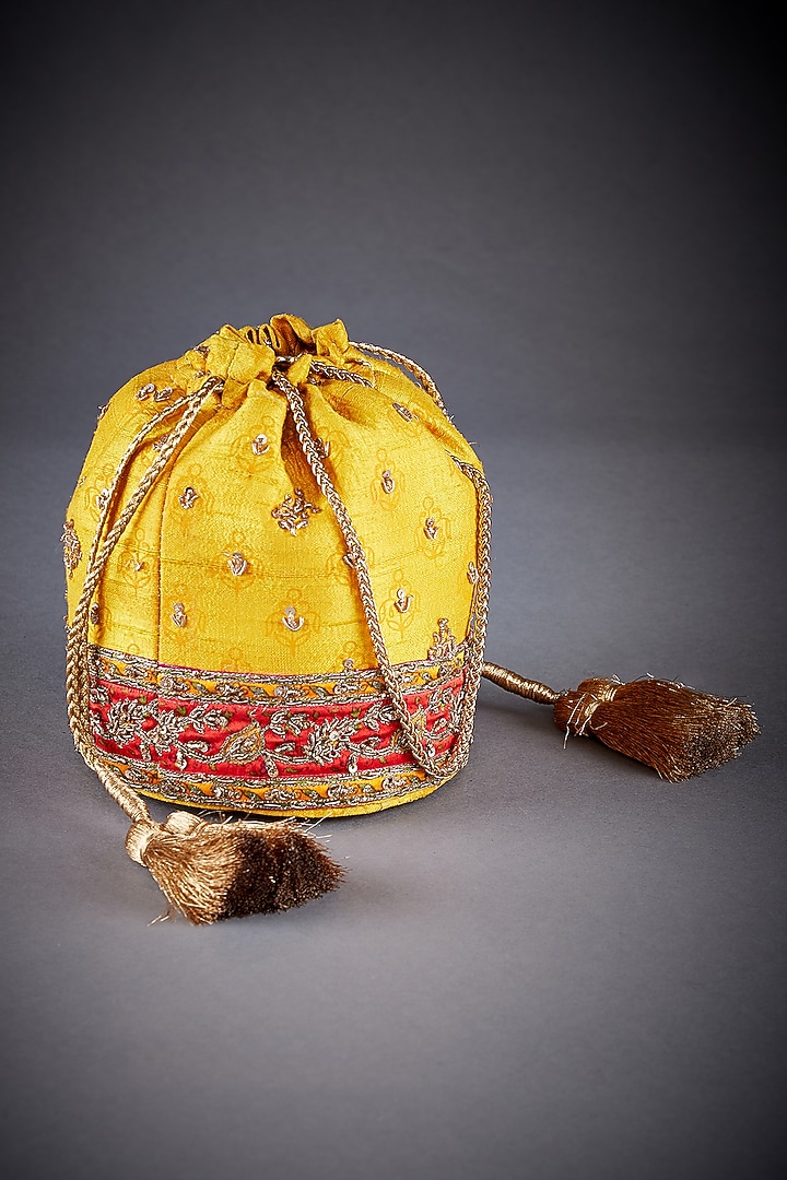 Yellow Raw Silk Printed Potli by Ri Ritu Kumar at Pernia's Pop Up Shop