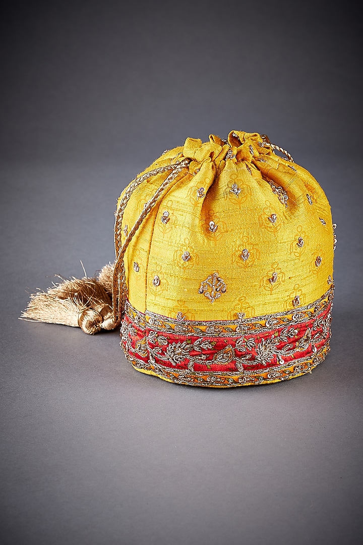 Yellow Raw Silk Printed Potli by Ri Ritu Kumar at Pernia's Pop Up Shop