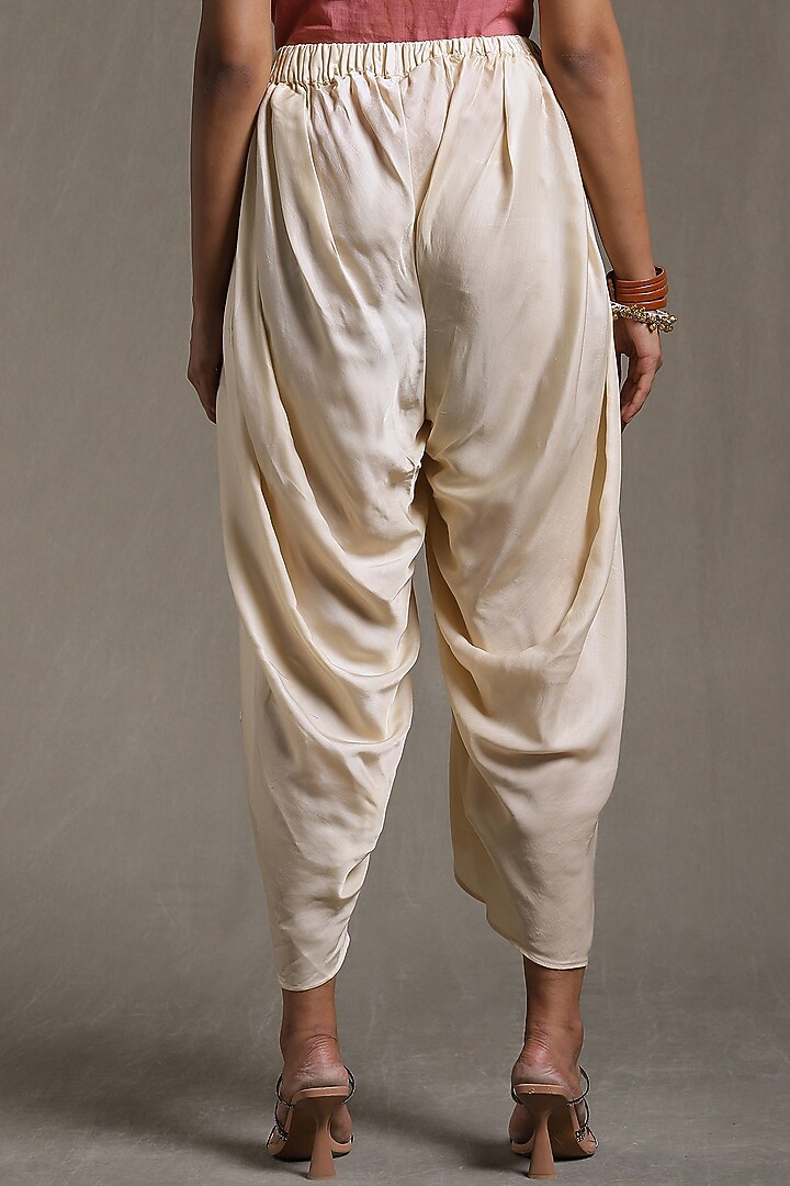 Ecru Satin Dhoti Pants by Ritu Kumar at Pernia's Pop Up Shop