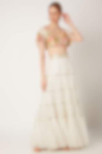 White Embroidered Blouse With Tiered Skirt by Ritika Mirchandani at Pernia's Pop Up Shop