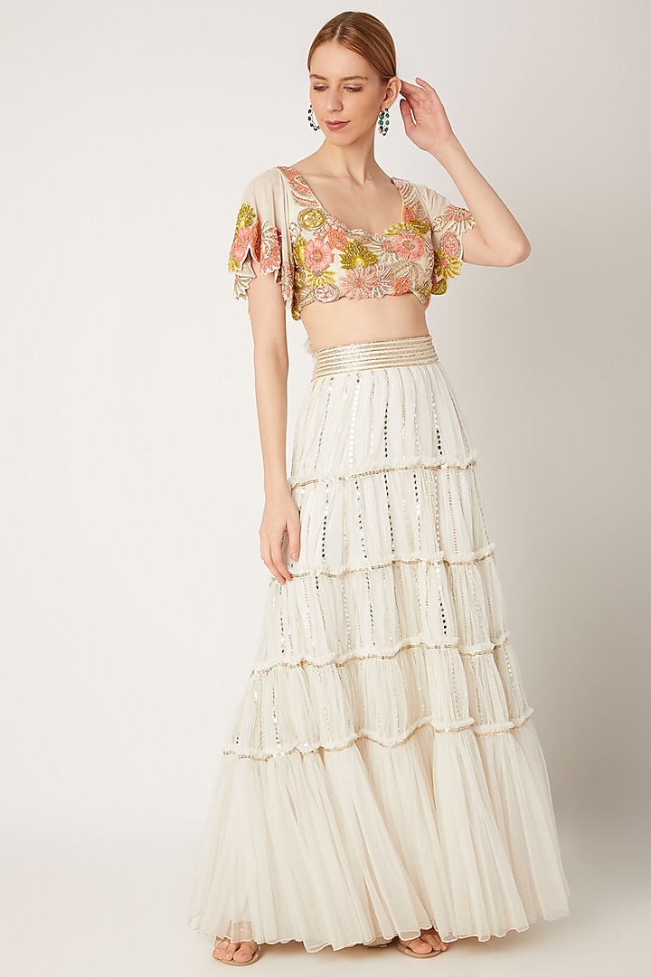 White Embroidered Blouse With Tiered Skirt by Ritika Mirchandani