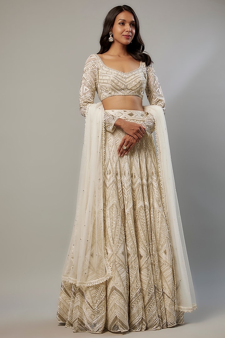 Ivory Crepe & Double Georgette Cutdana Embroidered Bridal Lehenga Set by Ritika Mirchandani at Pernia's Pop Up Shop