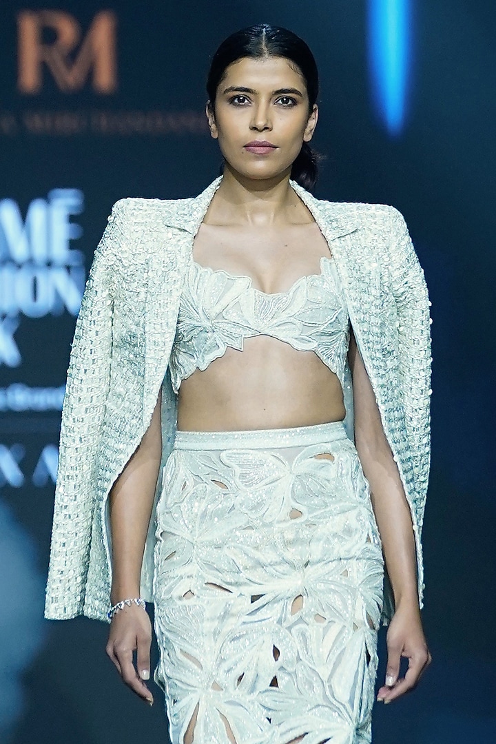 Ivory Net Floral Cutwork Skirt Set by Ritika Mirchandani at Pernia's Pop Up Shop