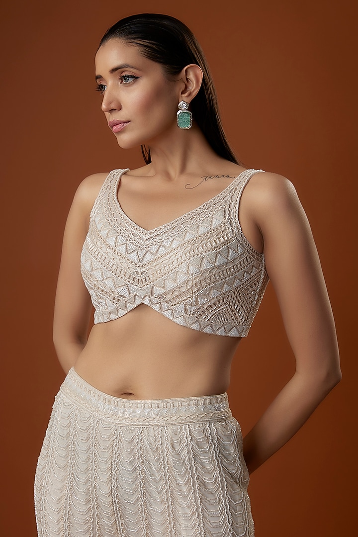 Ivory Crepe & Net Geometric Cutwork Jacket Set by Ritika Mirchandani at Pernia's Pop Up Shop
