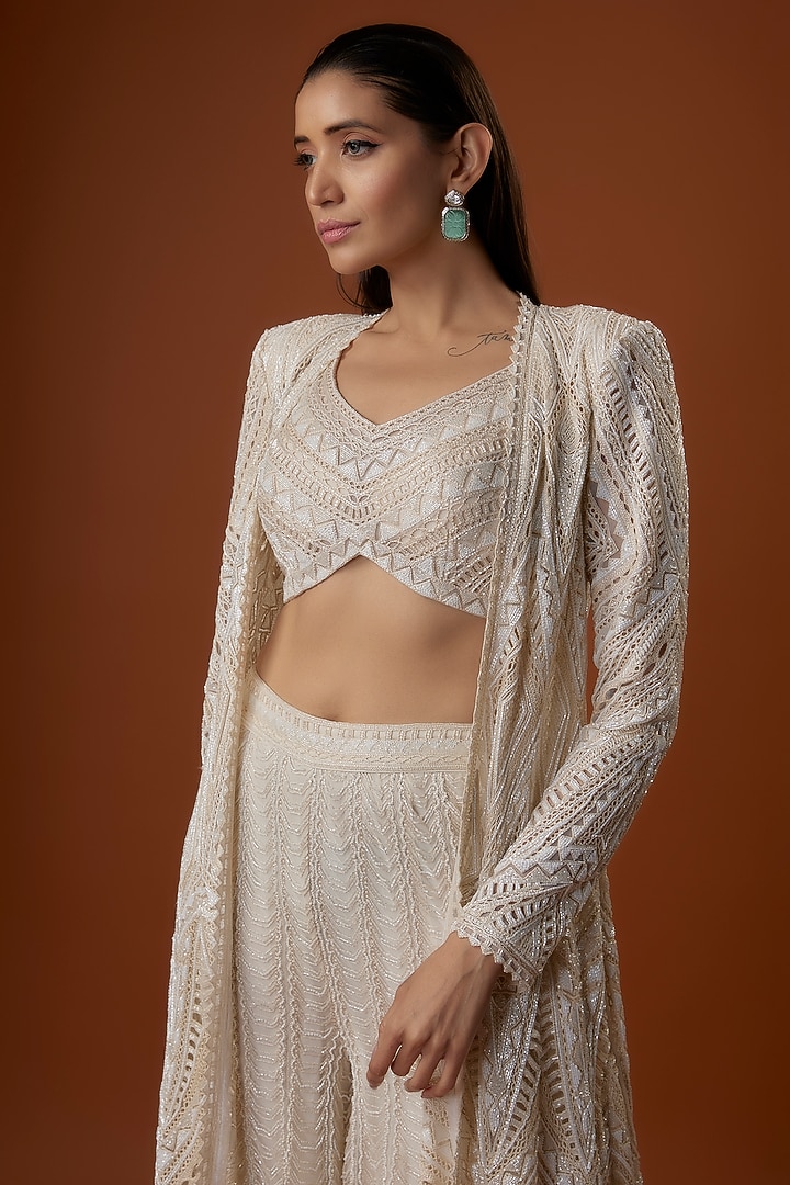 Ivory Crepe & Net Geometric Cutwork Jacket Set by Ritika Mirchandani at Pernia's Pop Up Shop