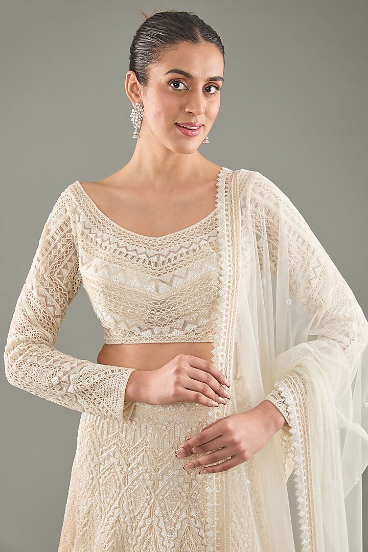 Ivory Crepe & Double Georgette Geometric Cutwork Bridal Lehenga Set by Ritika Mirchandani at Pernia's Pop Up Shop