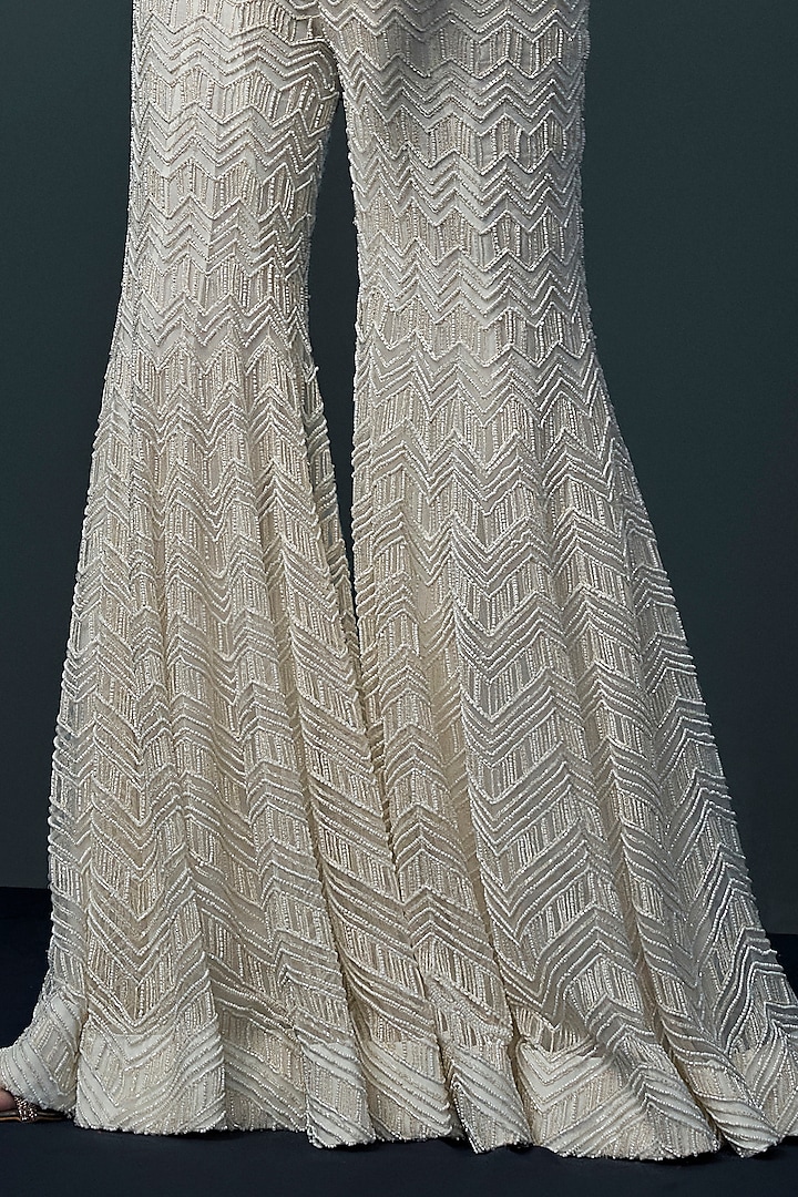 Ivory Double Georgette Floral Cutwork Kurta Set by Ritika Mirchandani at Pernia's Pop Up Shop