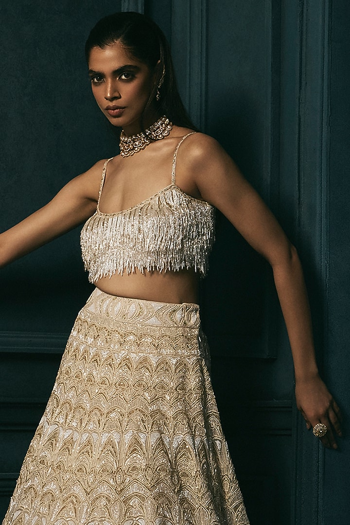 Ivory & Gold Crepe Crystal Embroidered Bridal Lehenga Set by Ritika Mirchandani at Pernia's Pop Up Shop