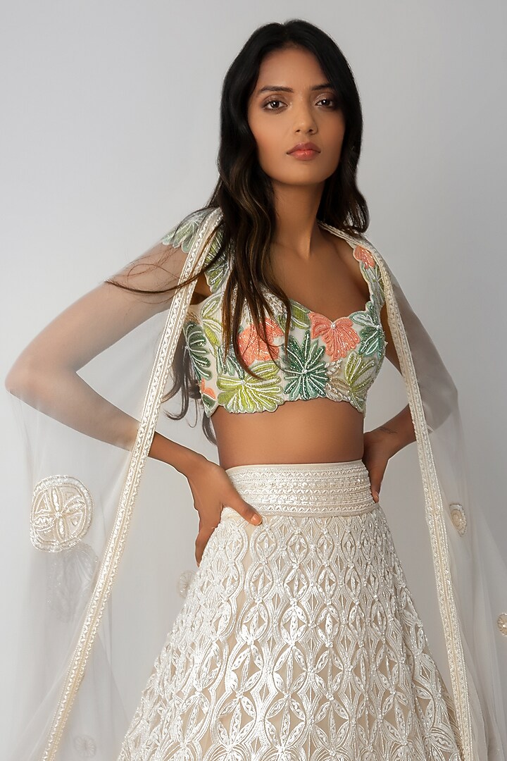 Ivory & Gold Embroidered & Floral Bridal Lehenga Set by Ritika Mirchandani at Pernia's Pop Up Shop
