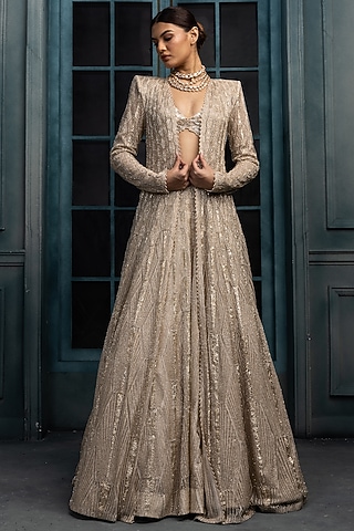 Ivory & Gold Crepe Crystal Embroidered Jacket Lehenga Set by Ritika Mirchandani