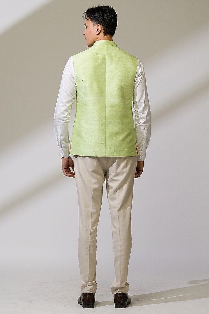 Green Raw Silk & Silk Hand Embroidered Bundi Jacket by Ritika Patel at Pernia's Pop Up Shop
