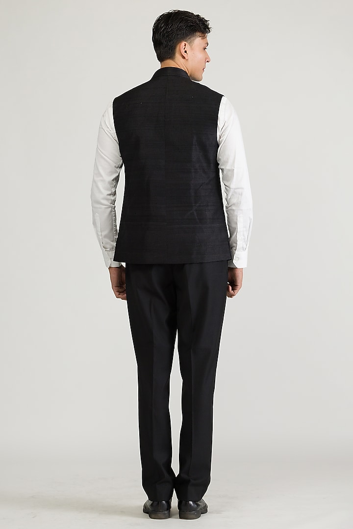 Black Raw Silk & Silk Hand Embroidered Bundi Jacket by Ritika Patel at Pernia's Pop Up Shop