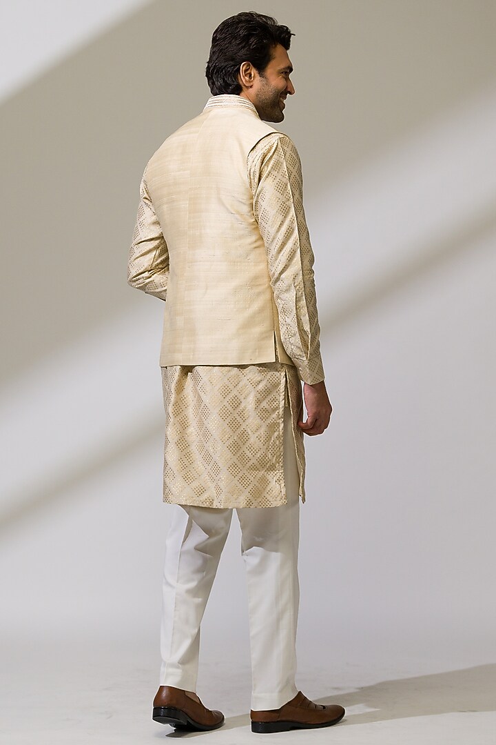Beige Raw Silk & Silk Hand Embroidered Bundi Jacket Set by Ritika Patel at Pernia's Pop Up Shop