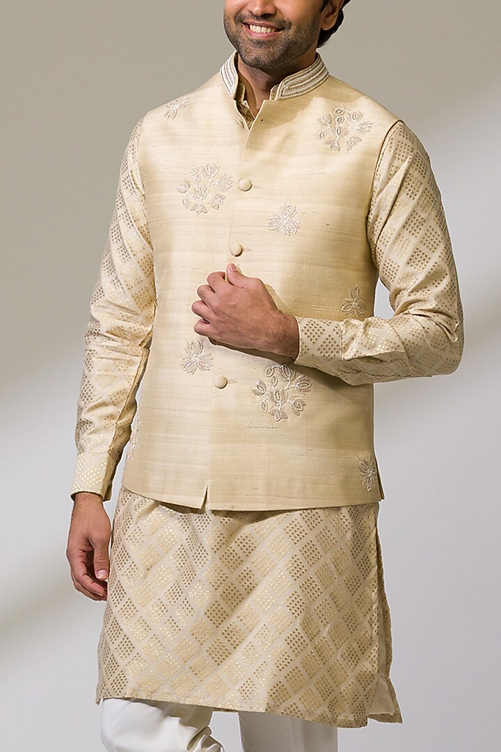 Beige Raw Silk & Silk Hand Embroidered Bundi Jacket Set by Ritika Patel at Pernia's Pop Up Shop