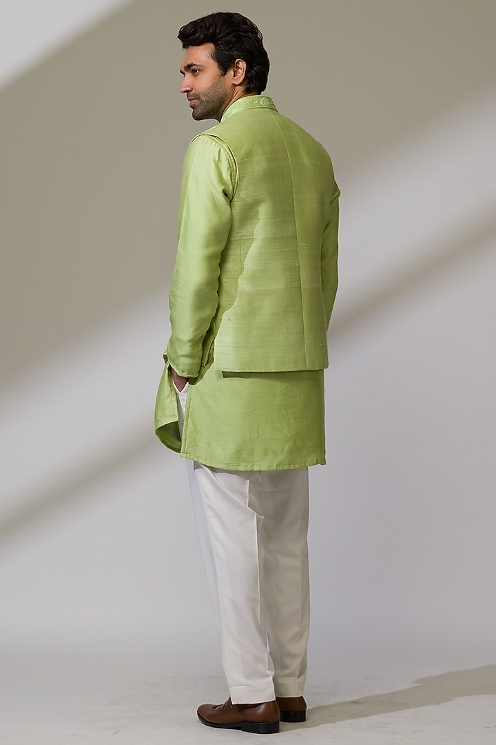 Green Raw Silk & Silk Hand Embroidered Bundi Jacket Set by Ritika Patel at Pernia's Pop Up Shop