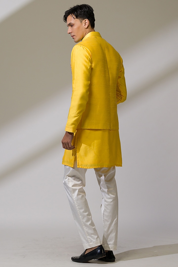 Yellow Raw Silk & Silk Hand Embroidered Bundi Jacket Set by Ritika Patel at Pernia's Pop Up Shop