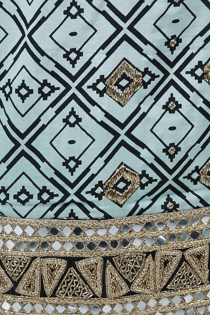 Ritika Mirchandani presents Blue and black embroidered two piece sari set with layered blouse available only at Pernia's Pop-Up Shop.