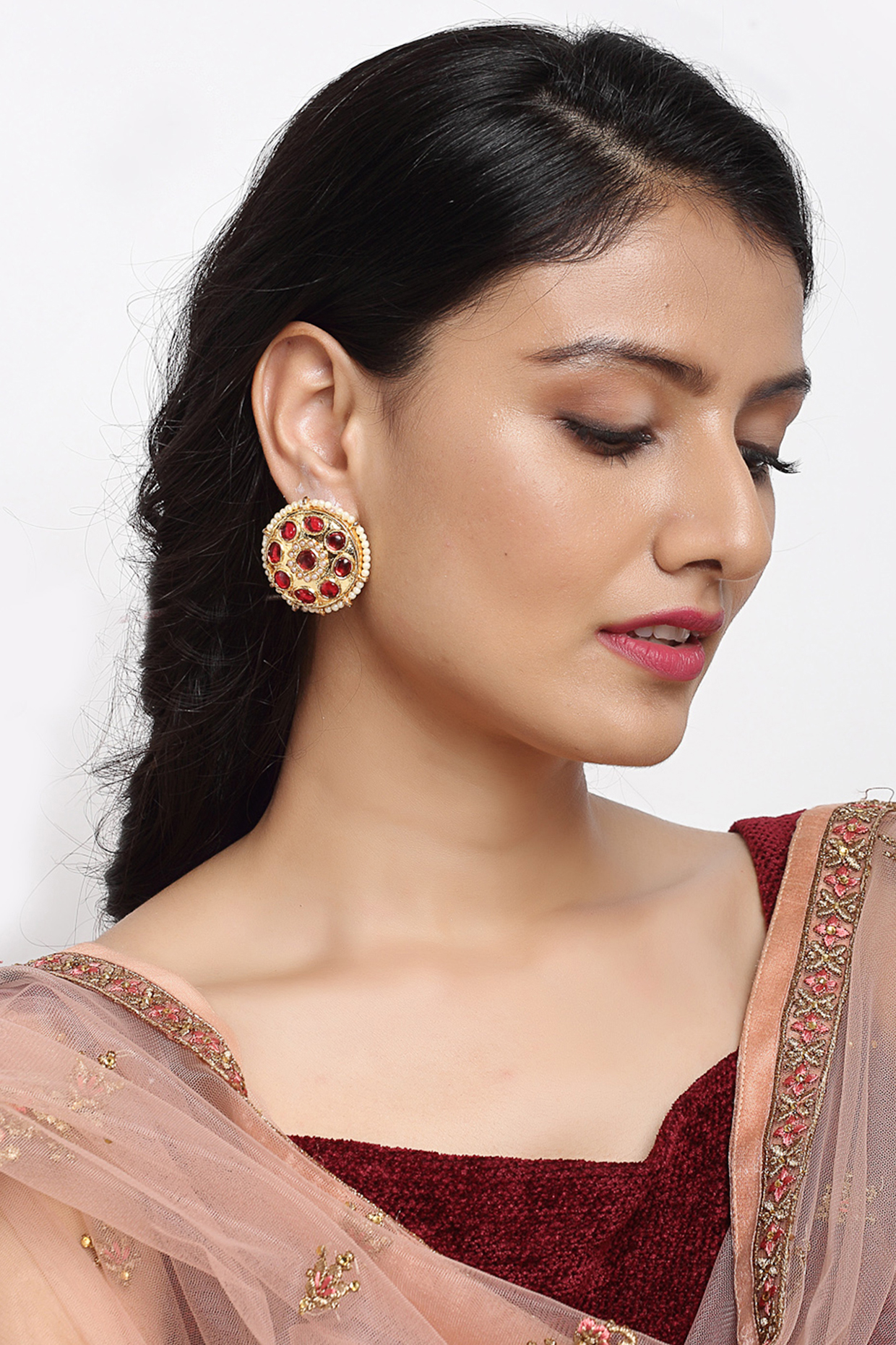 Gold Finish Red Kundan Polki Stud Earrings by Ruby Raang at Pernia's Pop Up Shop
