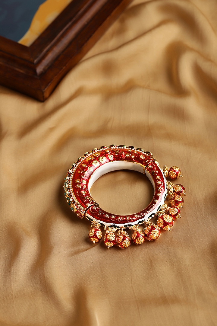 Gold Finish Pearl & Red Synthetic Stone Meenakari Bangle by Ruby Raang at Pernia's Pop Up Shop