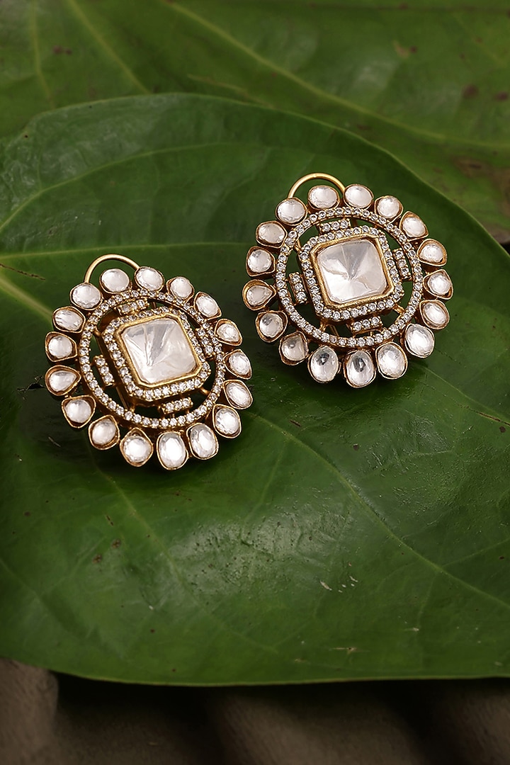Gold Finish Kundan Polki Stud Earrings by Ruby Raang at Pernia's Pop Up Shop