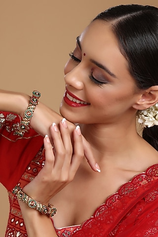 Gold Finish Multi-Colored Kundan Polki Bangles (Set Of 2) by Ruby Raang