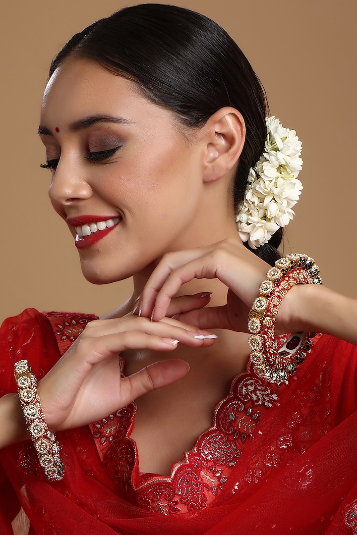 Gold Finish Multi-Colored Kundan Polki Bangles (Set Of 2) by Ruby Raang at Pernia's Pop Up Shop