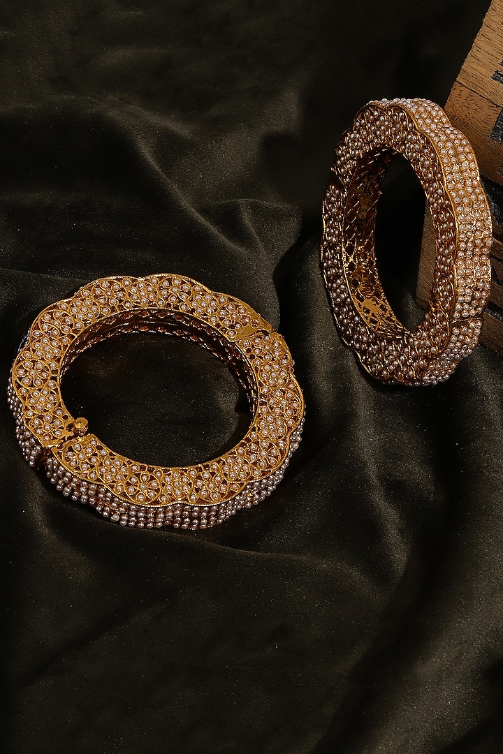 Gold Finish White Kundan Polki Bangles (Set Of 2) by Ruby Raang at Pernia's Pop Up Shop