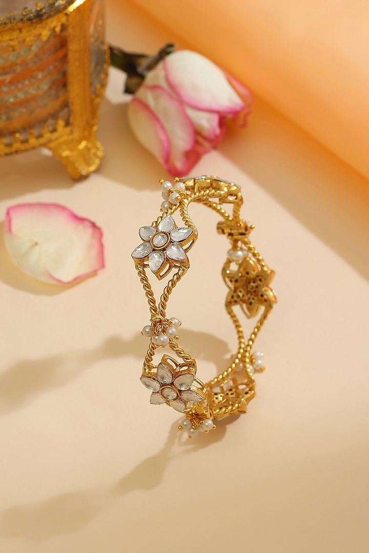Gold Finish Kundan Polki & Pearl Bracelet by Ruby Raang at Pernia's Pop Up Shop