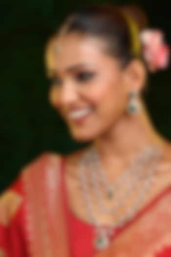 Gold Finish Moissanite & Emerald Stone Layered Necklace Set by Ruby Raang at Pernia's Pop Up Shop